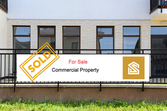 image shows commercial property with SOLD sign for commercial real estate closings in Myrtle Beach SC