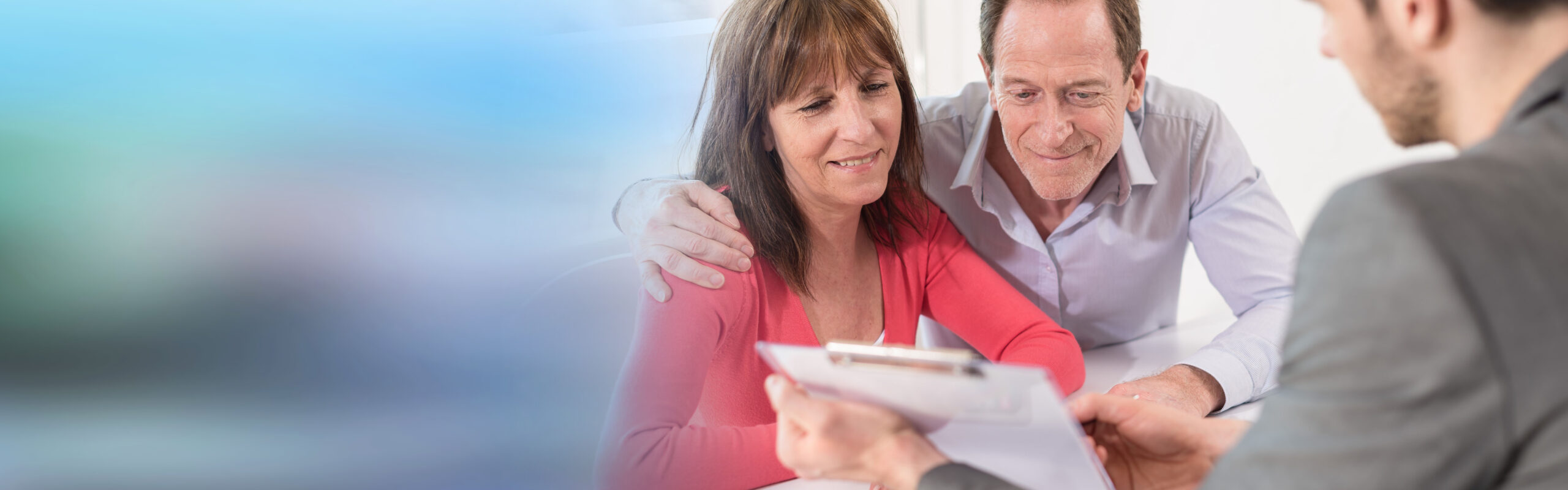image shows man and woman seated with estate planning attorney from The Pearce Law Group in Myrtle Beach SC